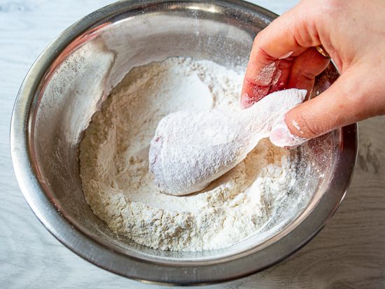 Roll chicken in flour