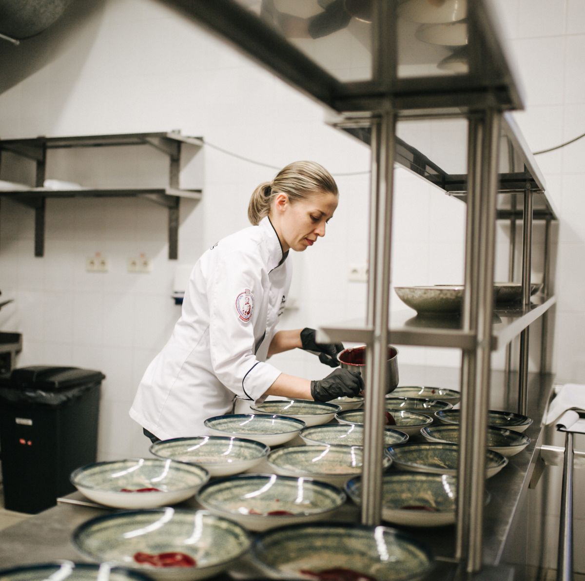 Tatyana Nazaruk serves the main course for gastronomic dinner