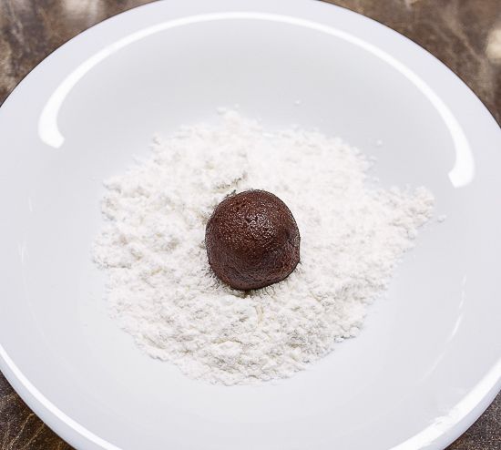 Roll the cookies in powdered sugar