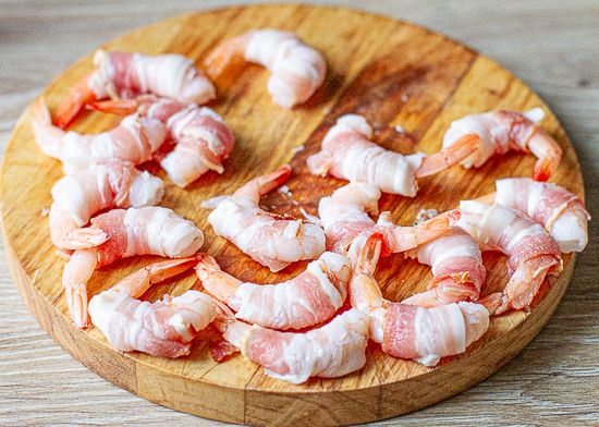 Wrap each shrimp in bacon