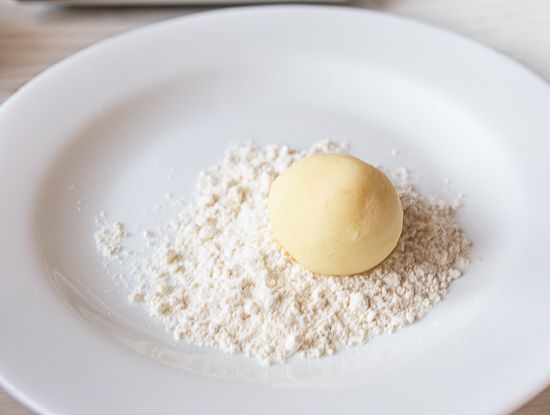 Roll in flour