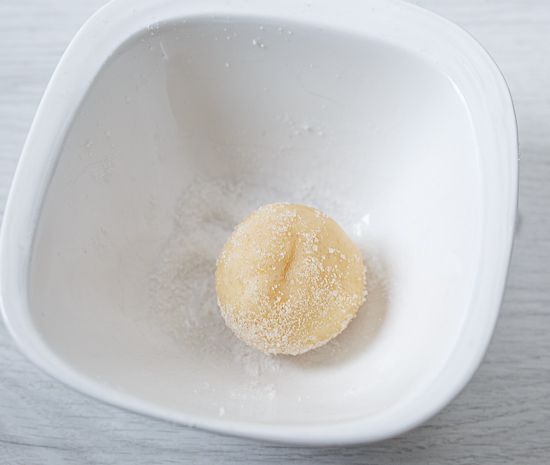 Roll the balls in sugar