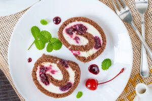 Chocolate Swiss Roll with Port-Poached Sour Cherries