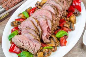 Roasted Beef Tenderloin with Sautéed Peppers & Mushrooms